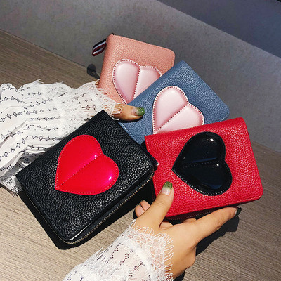 Άνετο γυναικείο πορτοφόλι από οικολογικό δέρμα με καρδιά σε τέσσερα χρώματα
