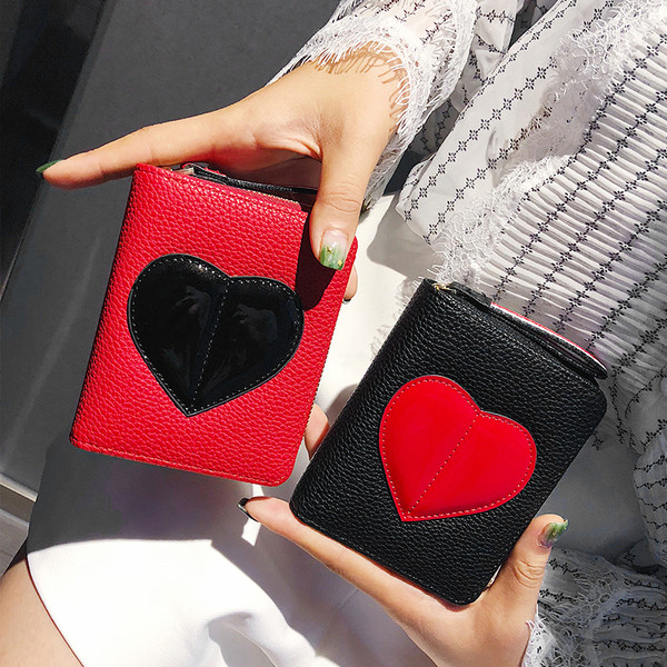 Удобено дамско портмоне от еко кожа със сърце в четири цвята