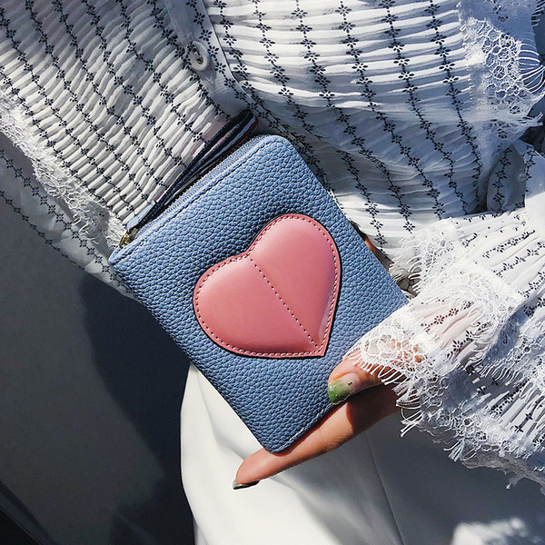 Удобено дамско портмоне от еко кожа със сърце в четири цвята