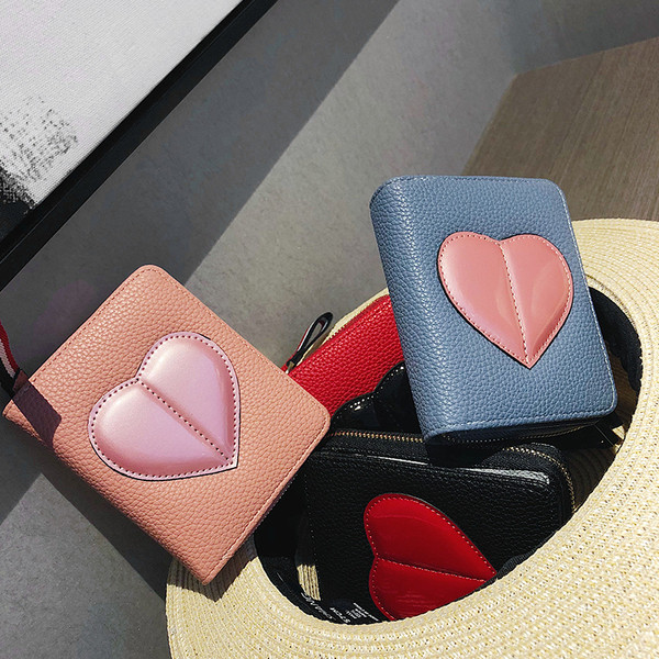 Удобено дамско портмоне от еко кожа със сърце в четири цвята