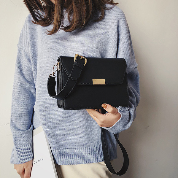 Geanta de dama eleganta din piele ecologica in negru, maro, alb si rosu