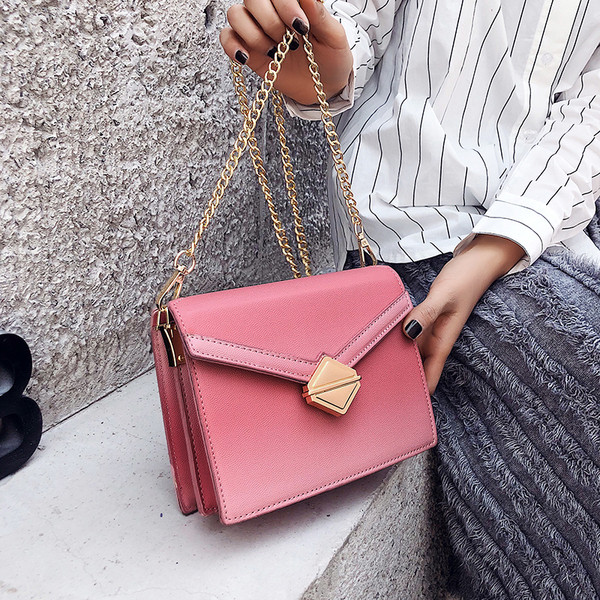 Geanta mica de dama din piele ecologica cu inchidere metalica de culoare visiniu, roz si albastru