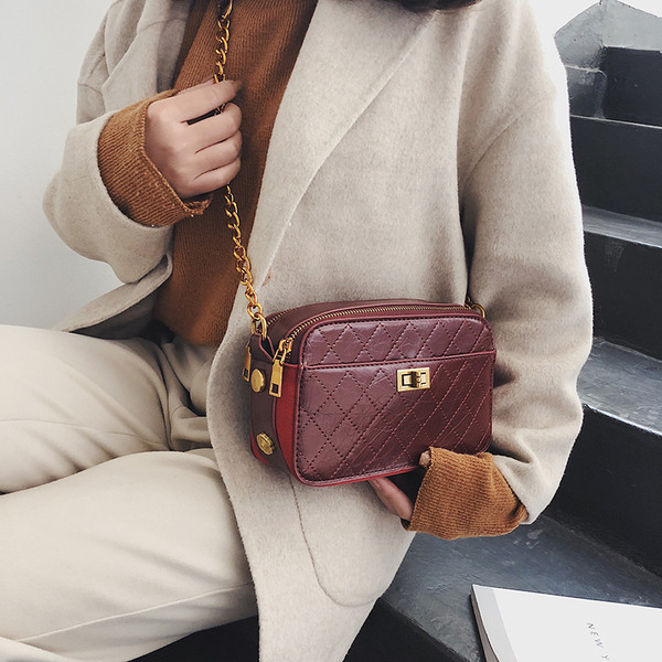 Geanta de dama moderna din piele ecologica de culoare maro, negru si visiniu