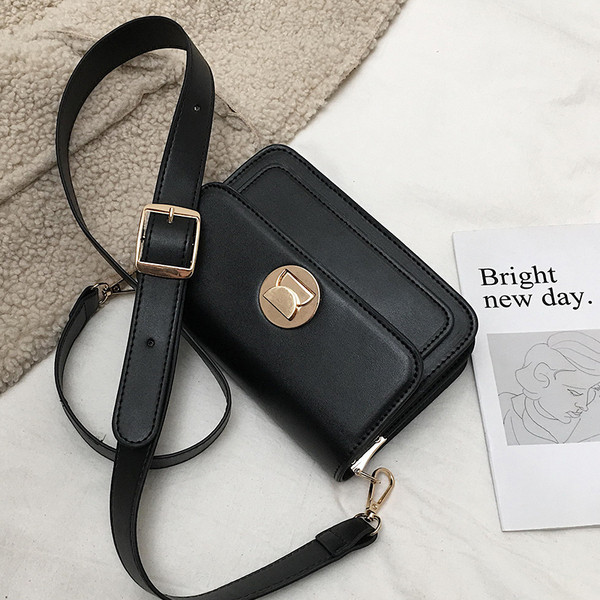 Κομψή γυναικεία δερματίνη τσάντα σε τρία χρώματα