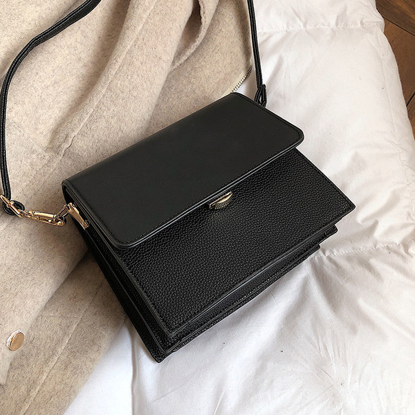 Μικρί τσάντα  από οικολογικό δέρμα σε δύο χρώματα