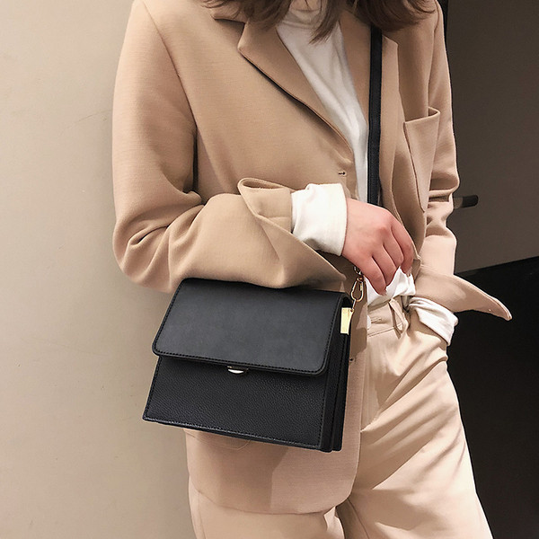 Μικρί τσάντα  από οικολογικό δέρμα σε δύο χρώματα