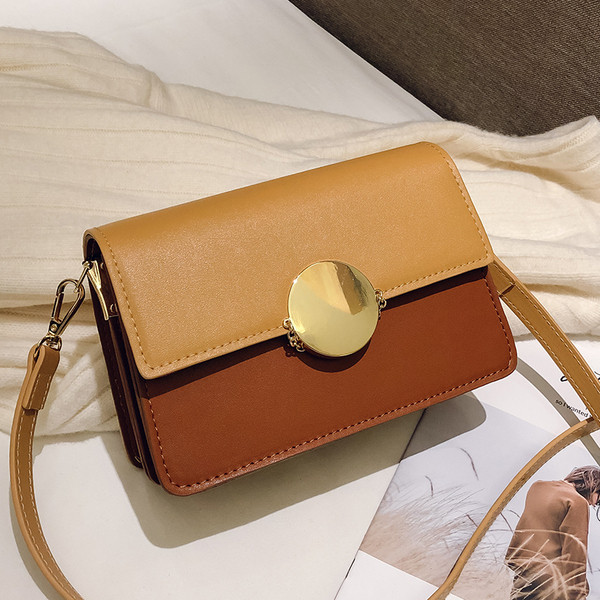 Τσάντα μικρού μεγέθους από οικολογικό δέρμα με μεταλλικό κούμπωμα σε τρία χρώματα