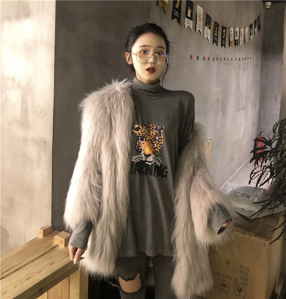 Modern női blúz, szürke, fehér és fekete színben