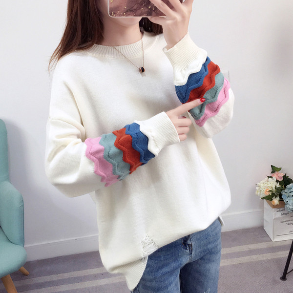 Női téli pulóver színes motívumokkal, öt színben
