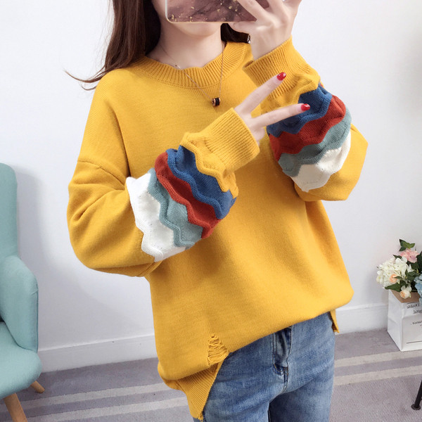 Női téli pulóver színes motívumokkal, öt színben