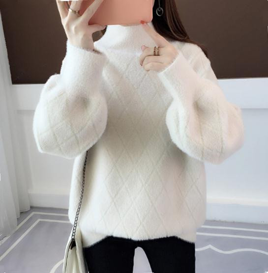 Téli női meleg pulóver magas gallérral több színben