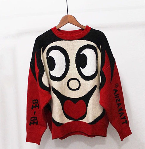 Modern női téli pulóver színes hímzéssel