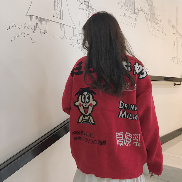 Modern női téli pulóver színes hímzéssel