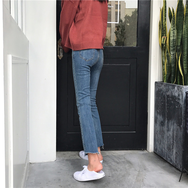 Modern női testhezálló farmernadrág