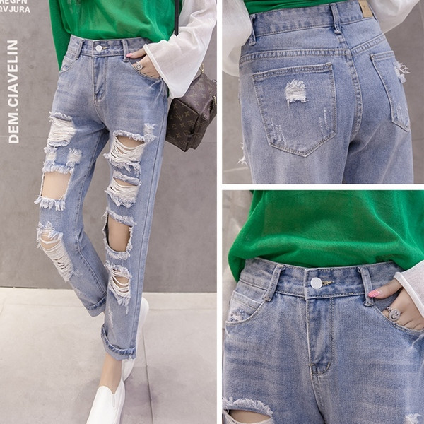 Blugi moderni de dama de culoare albastru deschis cu motive rupte