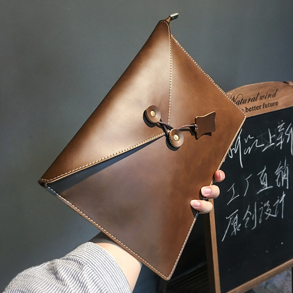 Κομψή δερμάτινη τσάντα σε τρία χρώματα