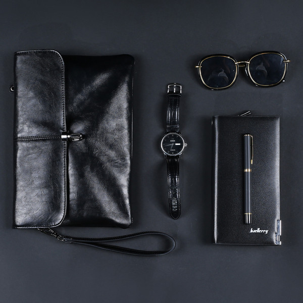 Κομψή μαύρη δερμάτινη τσάντα για άνδρες