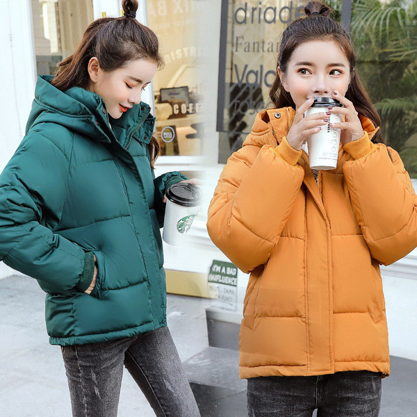 Női modern kabát több színben kapucnival