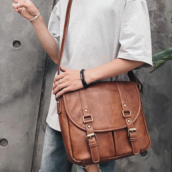 Ανδρική δερμάτινη τσάντα  σε καφέ και μαύρο χρώμα