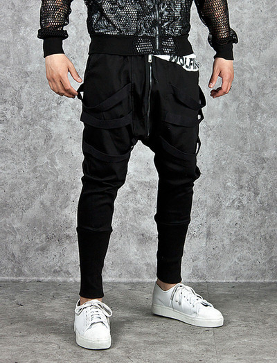 Modern men`s pants in black with a zipper