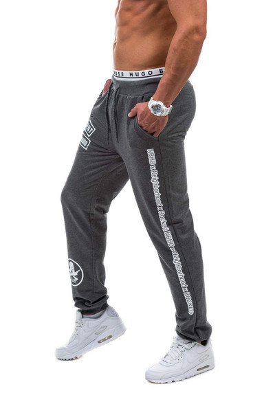 Мъжко спортно долнище с апликации и надпис в няколко цвята