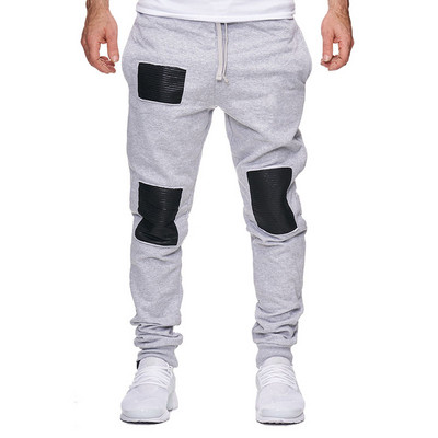 Мъжко спортно долнище в няколко цвята с елементи от еко кожа