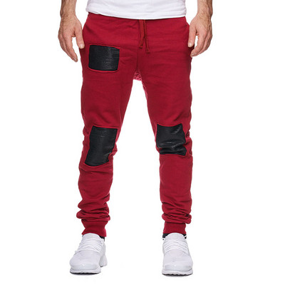 Мъжко спортно долнище в няколко цвята с елементи от еко кожа