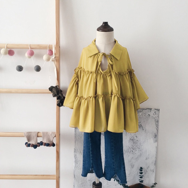 Cămașă actuală pentru copii pentru fete cu mâneci lotus de culoare galbenă