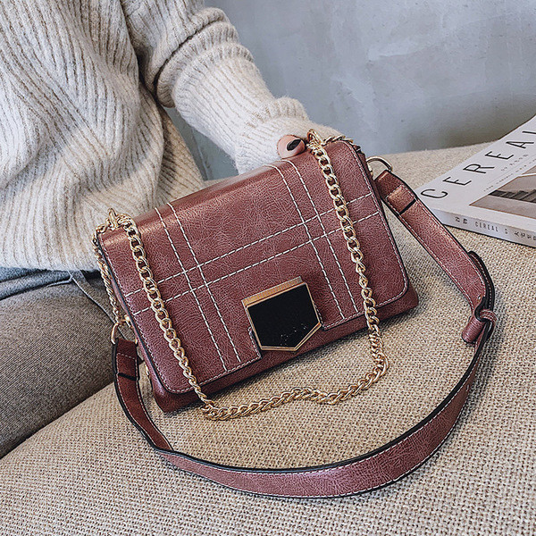 Geanta de dama eleganta cu elemente metalice in trei culori