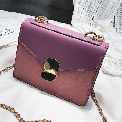 Γυναικεία τσάντα με μεταλλική λαβή σε τέσσερα χρώματα