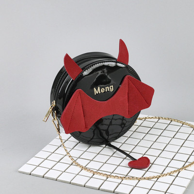 Kör alakú női táska 3D elemmel, két színben