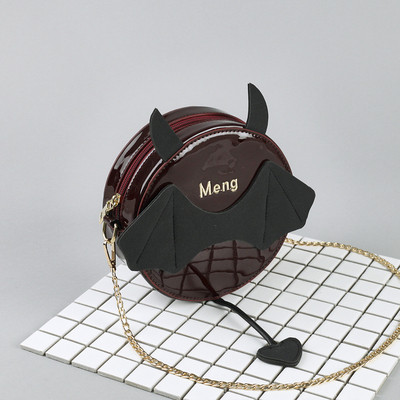 Kör alakú női táska 3D elemmel, két színben