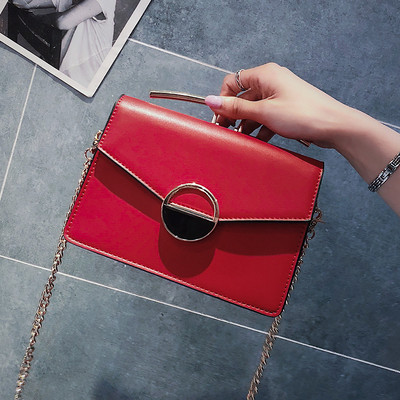 Fém fogantyús női táska négy színben