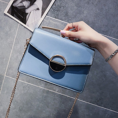 Fém fogantyús női táska négy színben