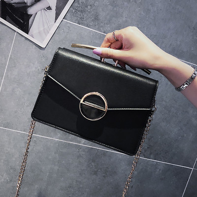 Fém fogantyús női táska négy színben