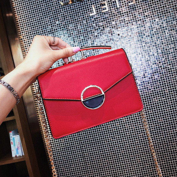 Fém fogantyús női táska négy színben