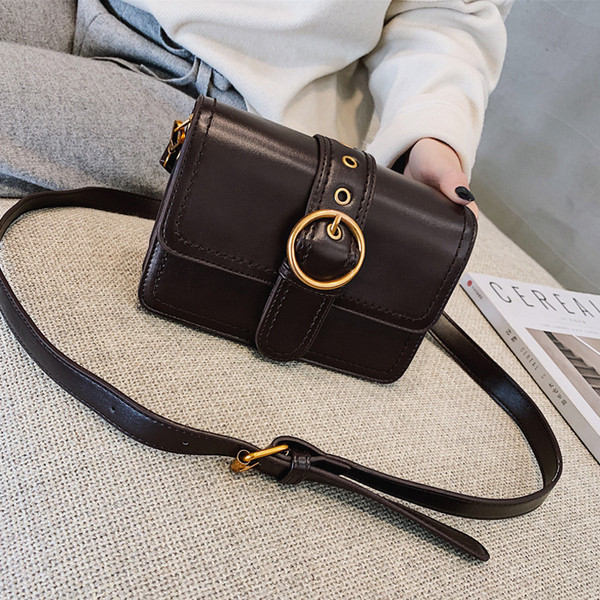 Γυναικεία κομψή τσάντα με  πόρπη σε τέσσερα χρώματα