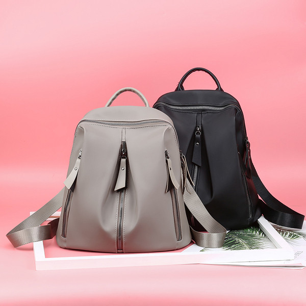 Modern női hátizsák két színben cipzárral
