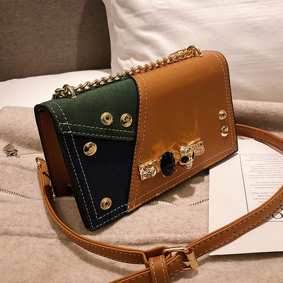 Stílusos kézitáska kövekkel díszítve