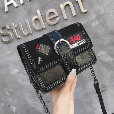 Modern női táska embléma díszítéssel