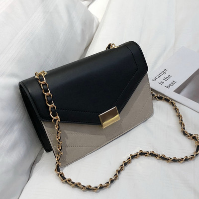 Κομψή γυναικεία τσάντα σε τέσσερα χρώματα με μεταλλική στερέωση