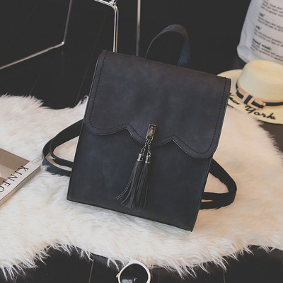 Eko bőrből készült stílusos női hátizsák bojttal, több színben