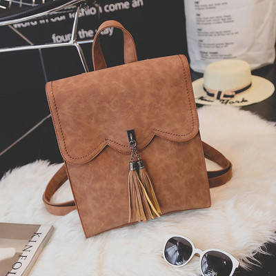 Eko bőrből készült stílusos női hátizsák bojttal, több színben