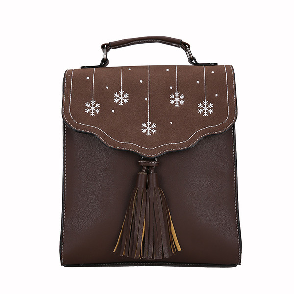 Több színben hímzéssel és bojttal ellátott női hátizsák