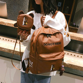 Μοντέρνο δερμάτινο σακίδιο με οικολογική δερμάτινη τσάντα με επιγραφή και κεντήματα σε διάφορα χρώματα