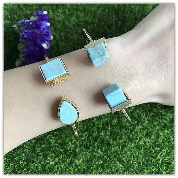 Modern női karkötő arany színű kövekkel - két modell