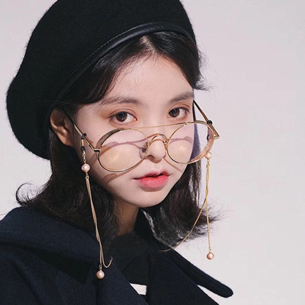 Stílusos női átlátszó szemüveg láncelemmel