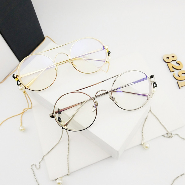 Stílusos női átlátszó szemüveg láncelemmel