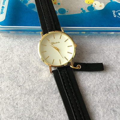 Stílusos karóra fekete és barna színben, férfiak és nők számára egyaránt