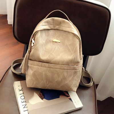 Öko bőrből készült női hátizsák bojttal, három színben